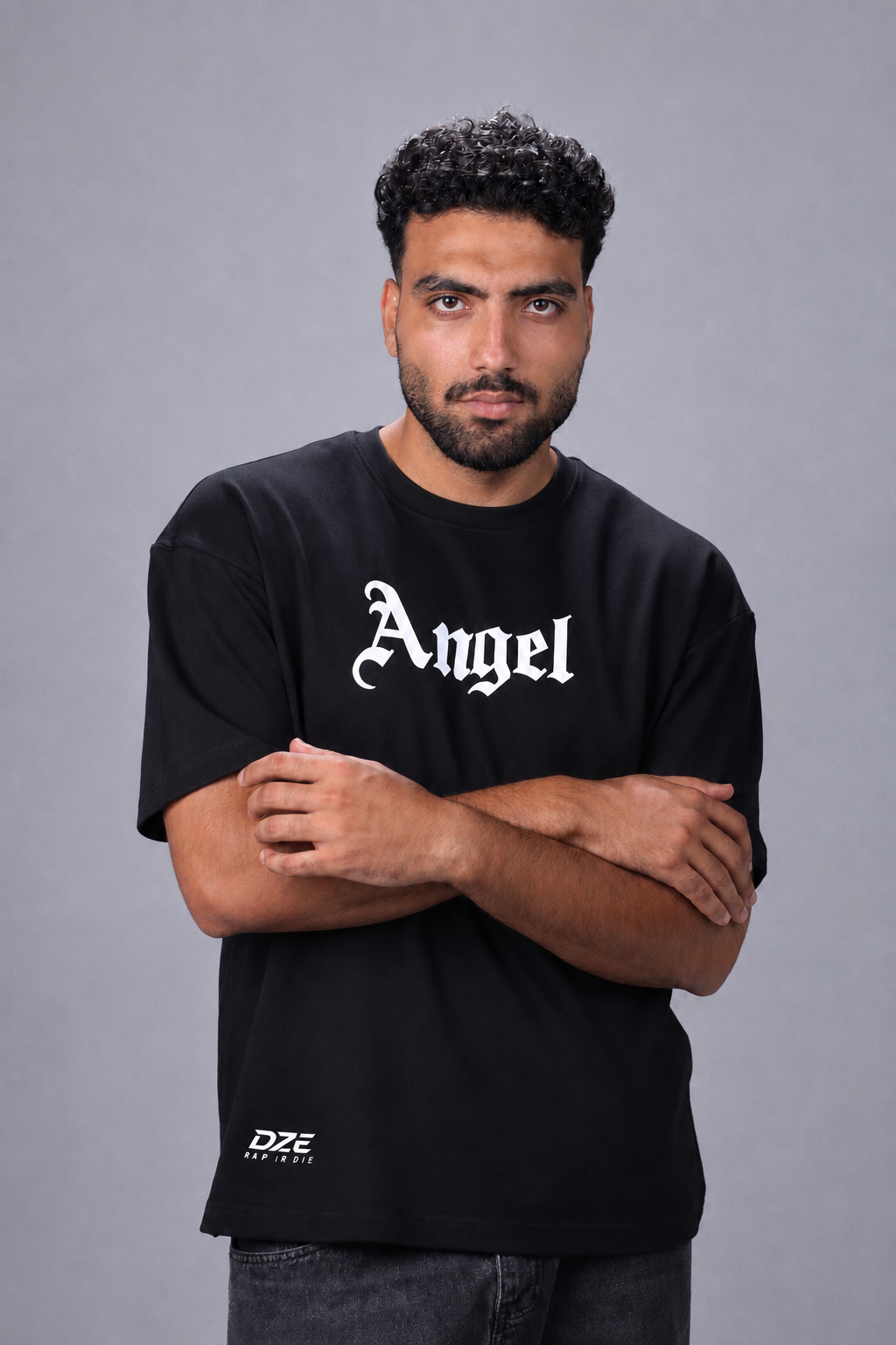 oversized heavyweight cotton T-shirt featuring blue angel wings graphic on the back.