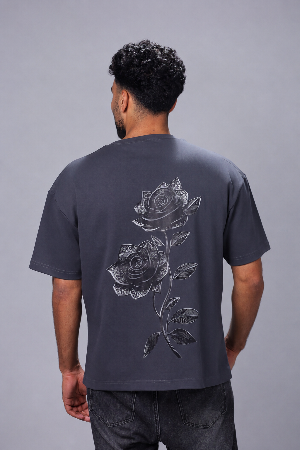 Charcoal oversized heavyweight cotton T-shirt featuring a monochrome floral graphic on the back.