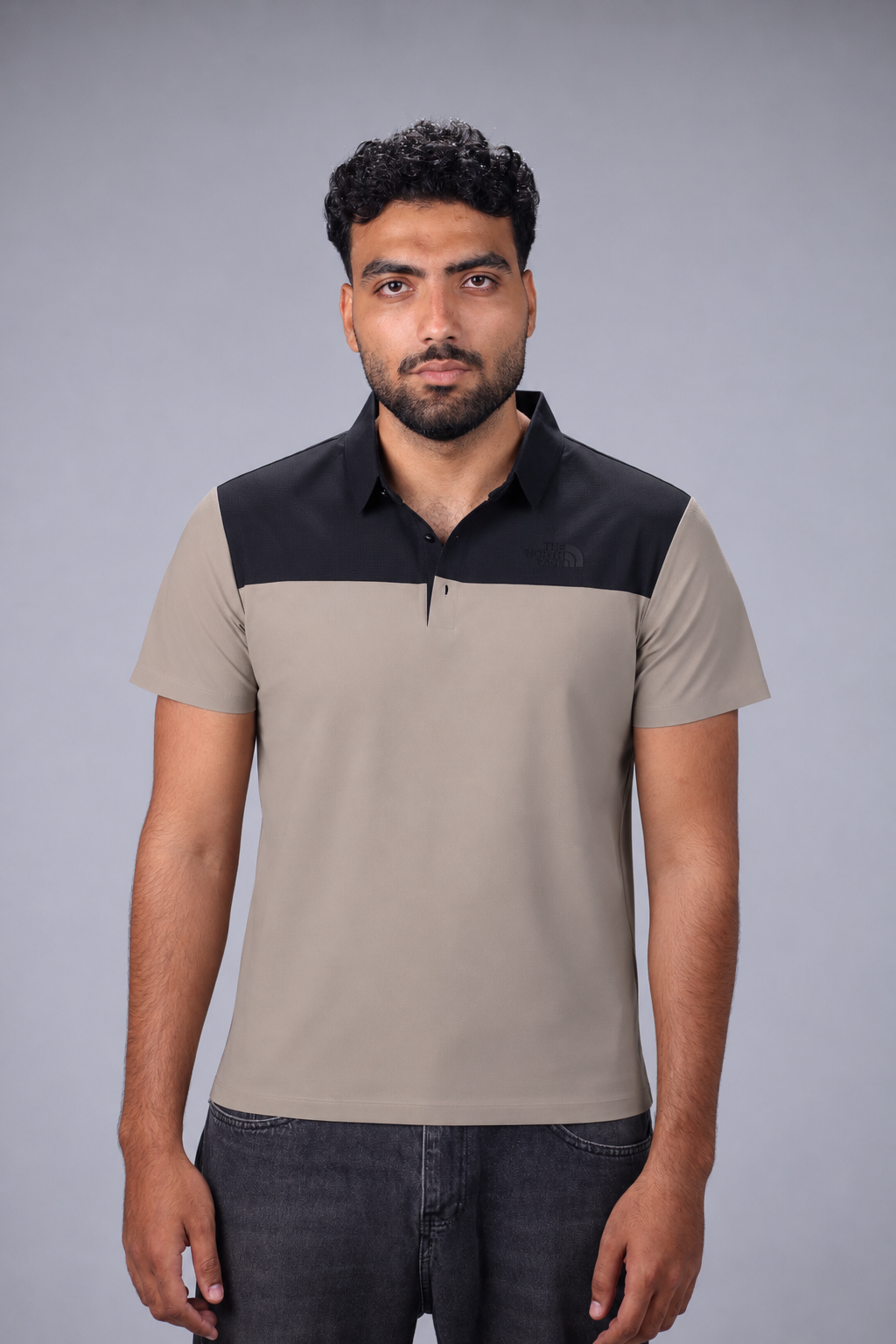 Greige and black men's performance polo shirt with breathable lightweight fabric and athletic fit.