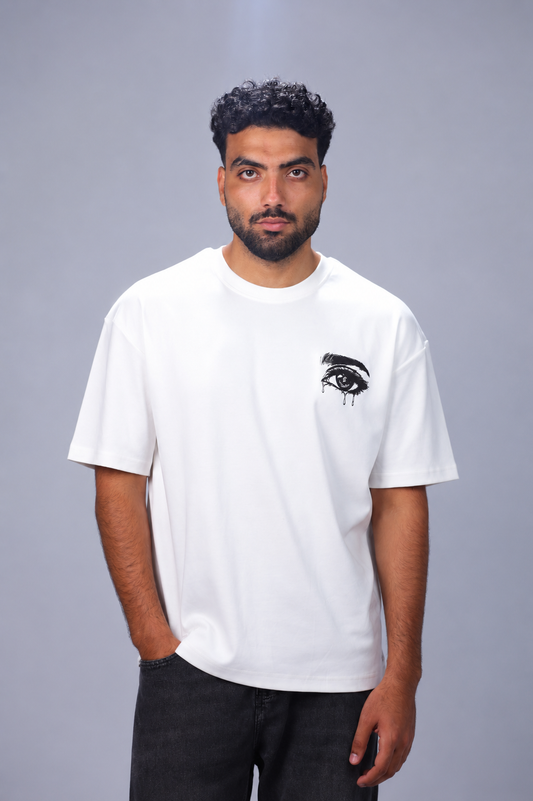 oversized heavyweight cotton T-shirt featuring an eye graphic on the front and bold street-inspired typography on the back.