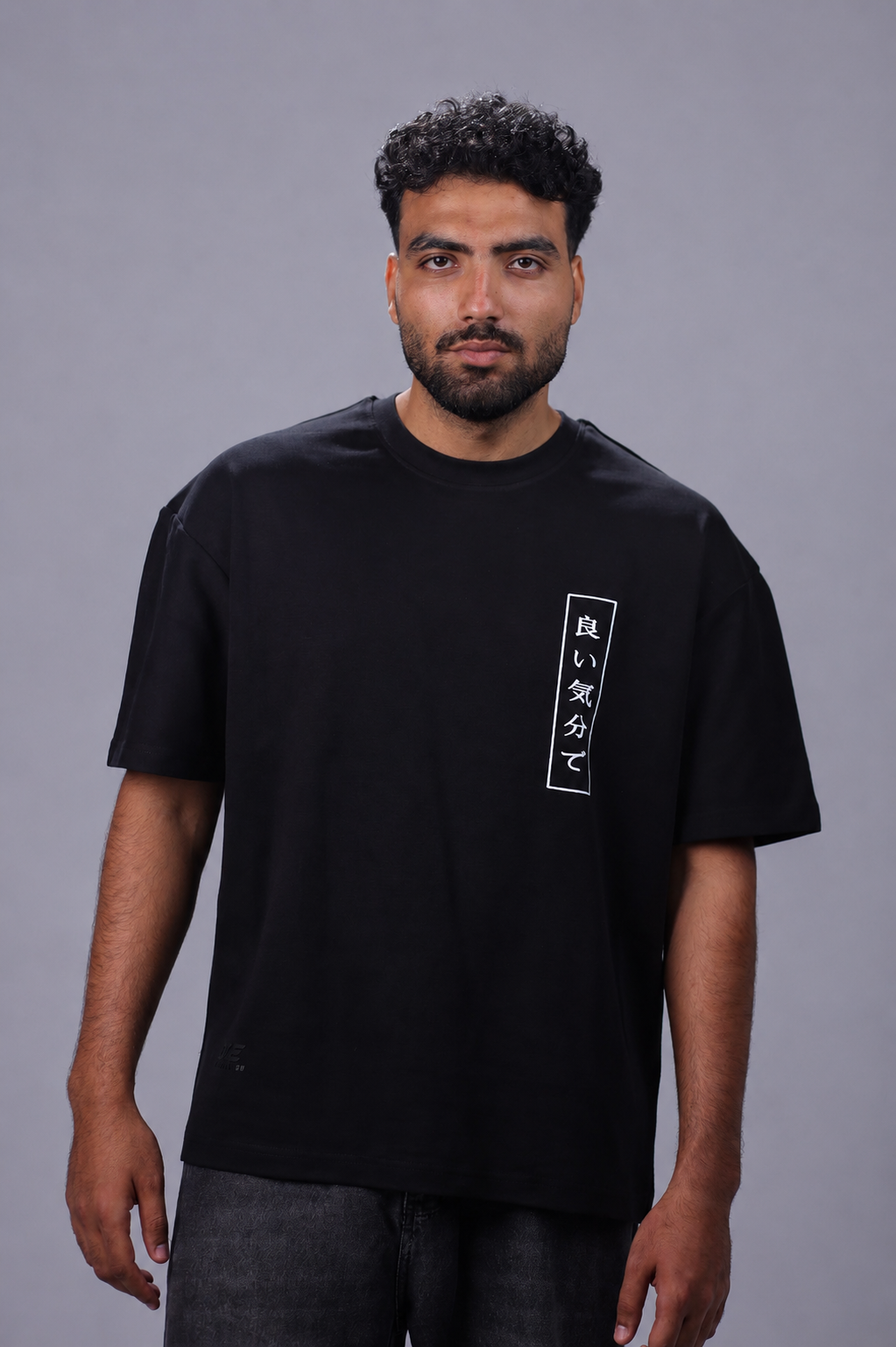 oversized heavyweight cotton T-shirt featuring Japanese typography and pink Sakura blossom graphics.