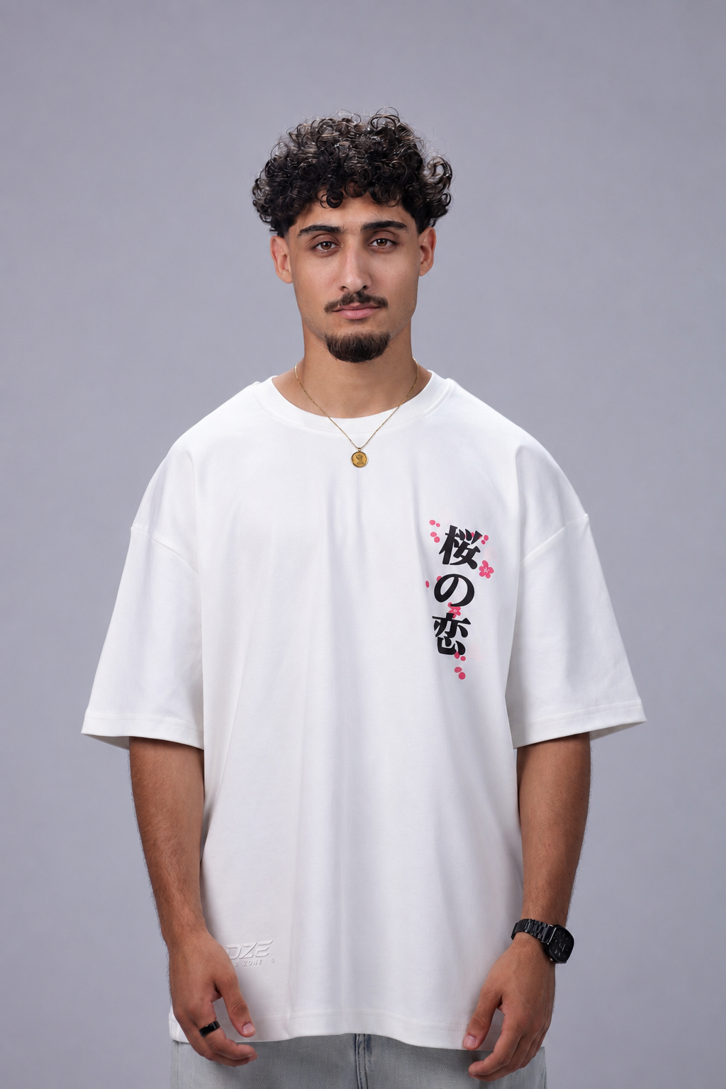 oversized heavyweight cotton T-shirt featuring a pink Sakura blossom graphic with Japanese typography